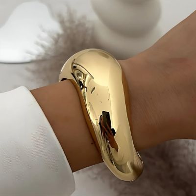 bracelet manchette model doré B-effet miroitant