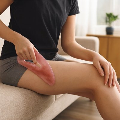 gua sha corps pour massage des jambes