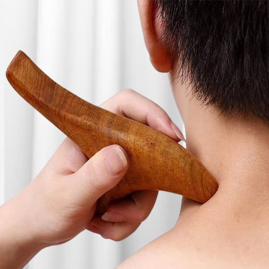 outil gua sha bois massage facial et corporel