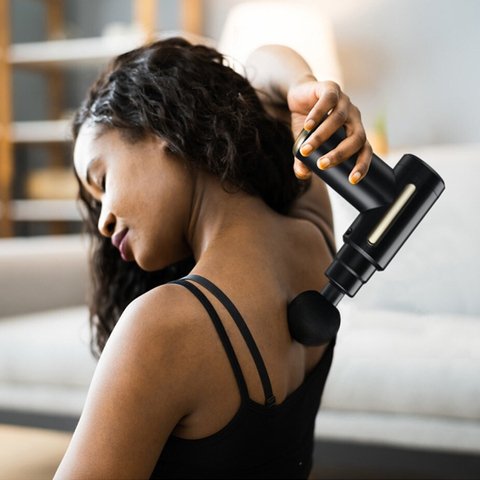 Pistolet de massage pour un massage dorsal
