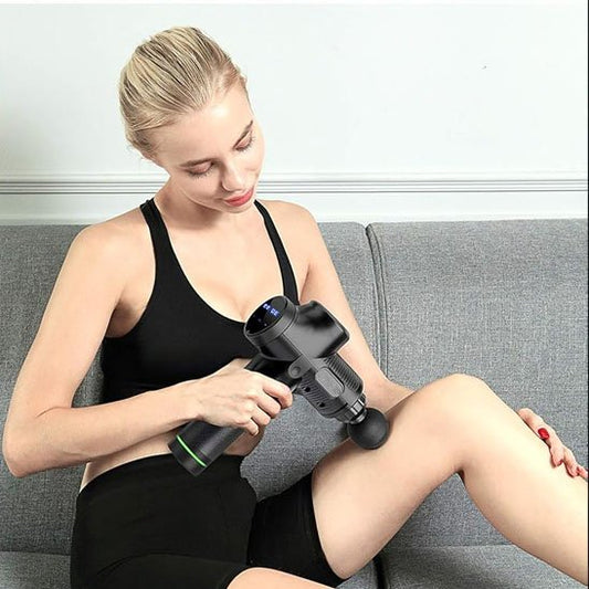 Pistolet de massage pour une relaxation des jambes