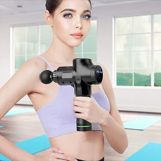 Pistolet de massage utilisé après une séance zumba