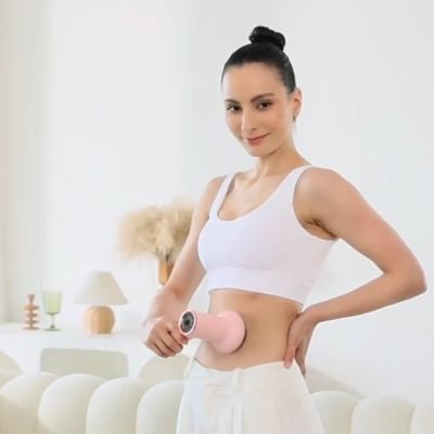 pistolet masseur pour un massage abdominal peau lisse