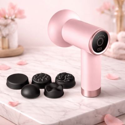 pistolet masseur rose et accessoires