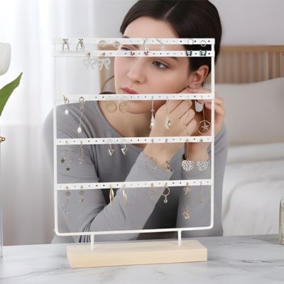 porte boucle d'oreille blanc stabilité de la base