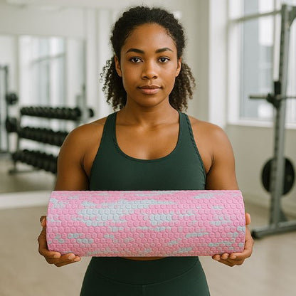 une coach sportive tien son rouleau de massage multicolore
